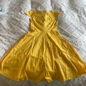 Brand new never worn woman’s size small yellow Sun dress